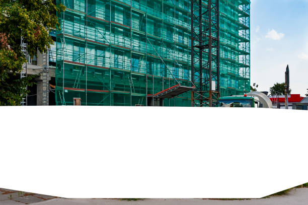 istock Blank white banner for advertisement on the fence of construction site 1224638913