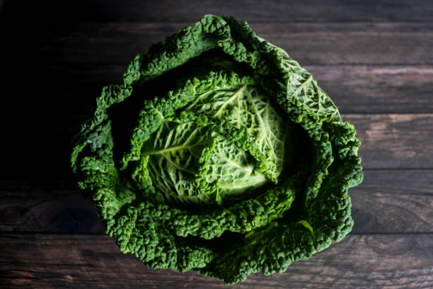 istock view of savoy cabbage on wooden background 1224639507