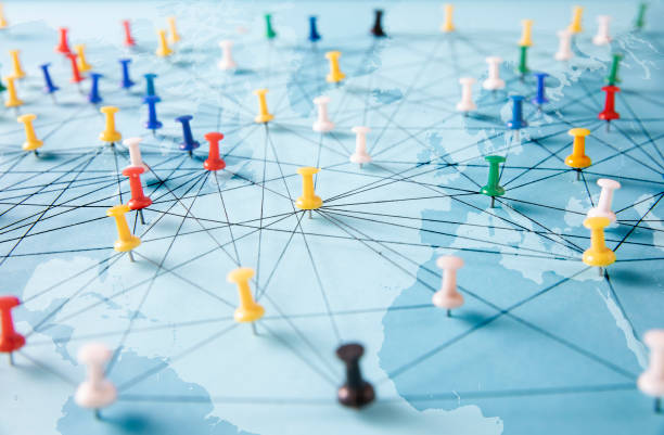 Global Connections Connection concept with push pins on a world map global business stock pictures, royalty-free photos & images