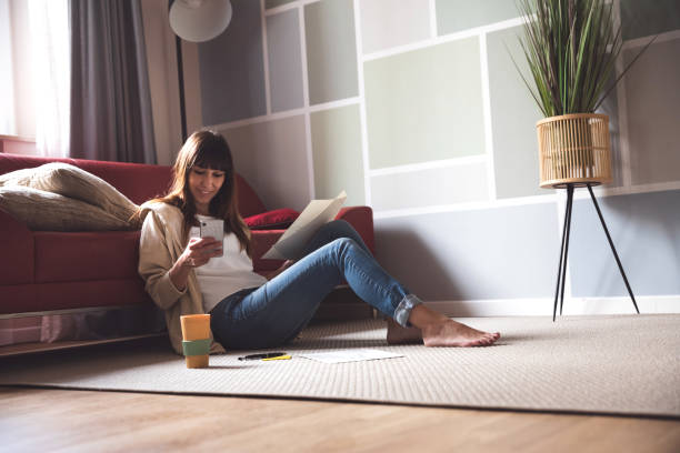 istock Woman having a business phonecall while working from home 1224640520