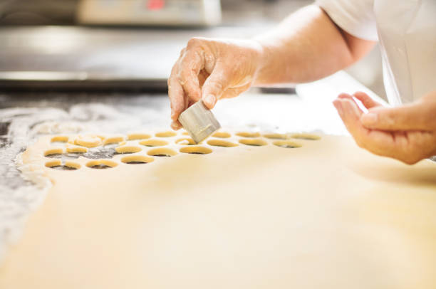 istock Cutting round cookies from the dough 1224643456