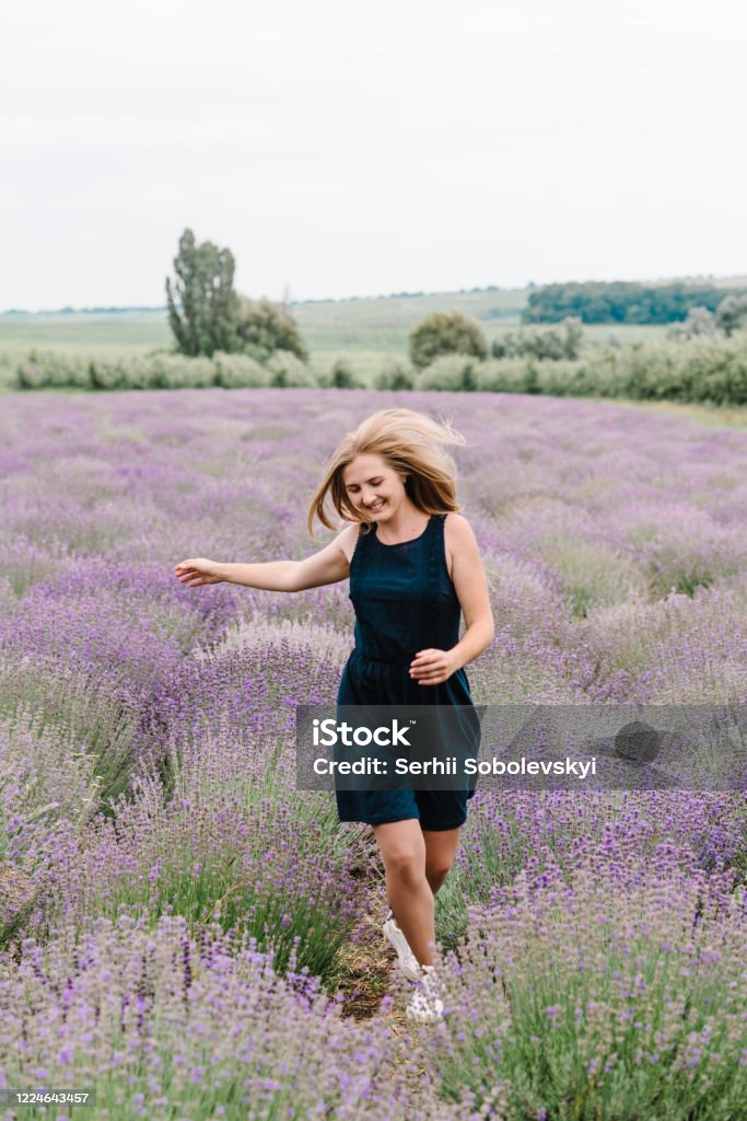 Beautiful Woman Funny Walk On The Lavender Field On Sunset Beautiful Girl In Dress Stand And Flying Long Hair On Purple Lavender Field Soft Focus Enjoy The Floral Glade Summer Nature Hairstyle Beautiful Woman Funny Walk On The Lavender Field On Sunset Beautiful Girl In Dress Stand And Flying Long Hair On Purple Lavender Field Soft Focus Enjoy The Floral Glade Summer Nature Hairstyle