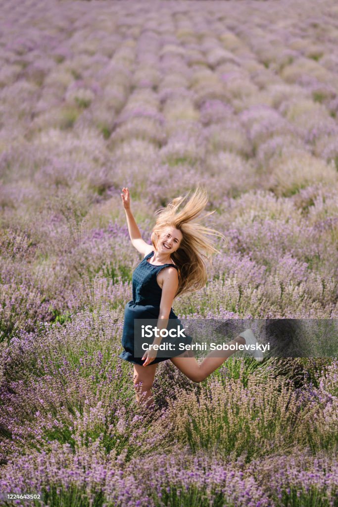 Beautiful Woman Funny Walk On The Lavender Field On Sunset Beautiful Girl In Dress Stand And Flying Long Hair On Purple Lavender Field Soft Focus Enjoy The Floral Glade Summer Nature Hairstyle Beautiful Woman Funny Walk On The Lavender Field On Sunset Beautiful Girl In Dress Stand And Flying Long Hair On Purple Lavender Field Soft Focus Enjoy The Floral Glade Summer Nature Hairstyle