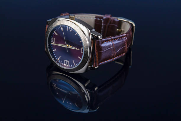 istock Men wrist watch with leather bracelet on black 1224645873