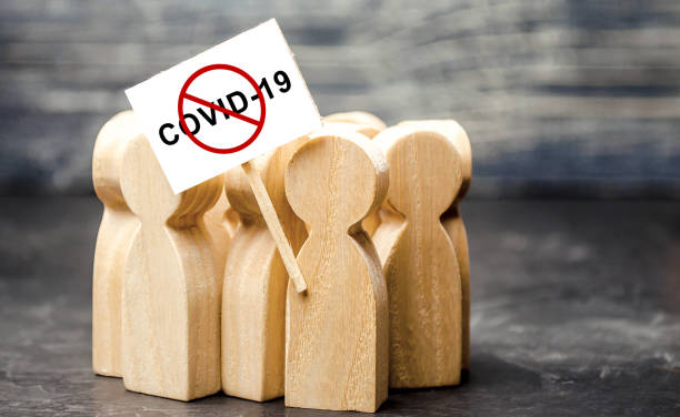 istock Protesting people calling to stop quarantine prohibitory measures. Exposure to dangers of coronavirus COVID-19, call resist restrictions. onspiracy theories followers. Distrust official information. 1224646413
