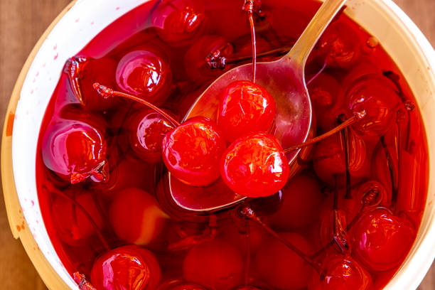 istock Delicious cherries in bowl on wooden background. 1224646455