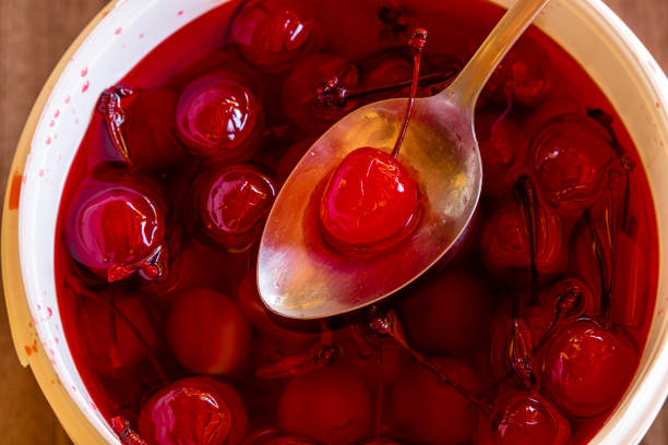 istock Delicious cherries in bowl on wooden background. 1224646482