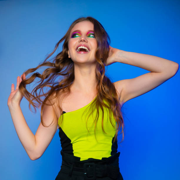 istock Beautiful Young Girl with Bright Color Makeup 1224646506