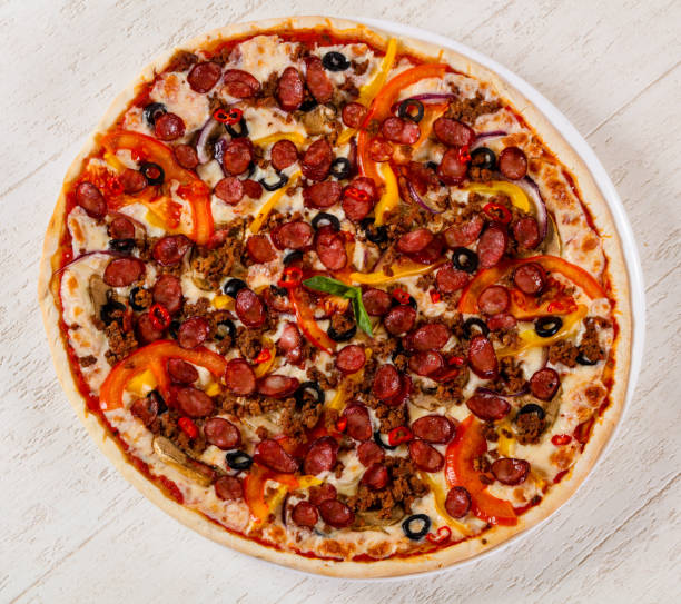 istock Pizza with sausages and minced meat 1224646920