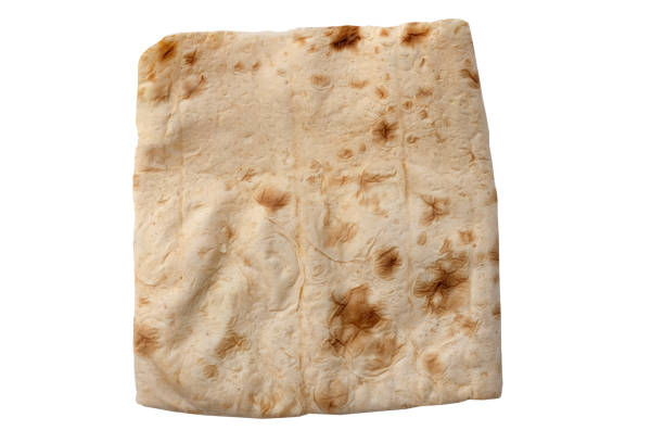 istock Thin pita bread on a white background isolate. Armenian pita bread 1224654236