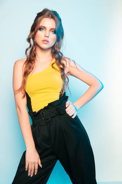 istock Beautiful Young Girl with Bright Color Makeup 1224658389