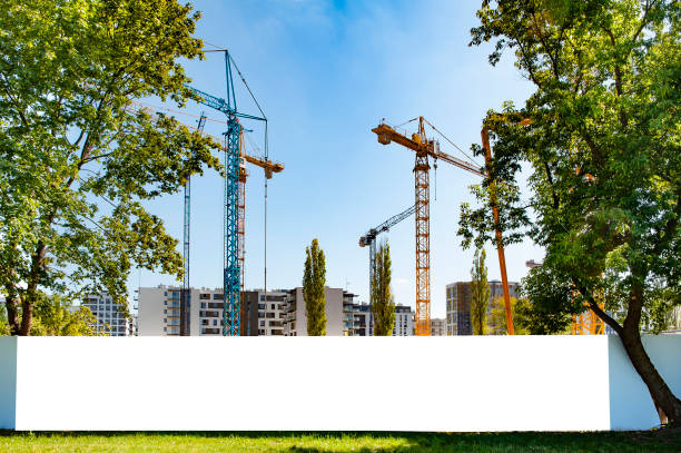 Blank white banner for advertisement on the fence of construction site
