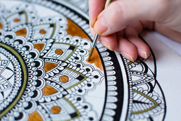 Mandala drawing with brush. Close up.
