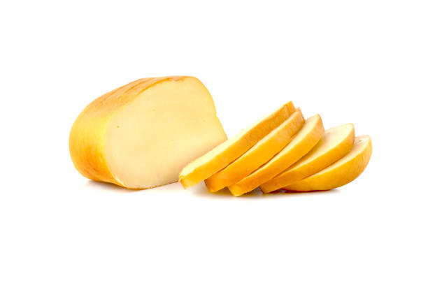istock Cheese on a white background. Smoked cheese close-up on a white background. 1224661917