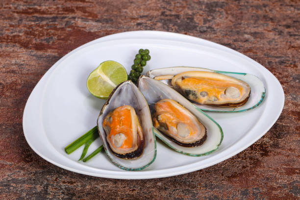 istock Half mussels with lime and pepper 1224663208