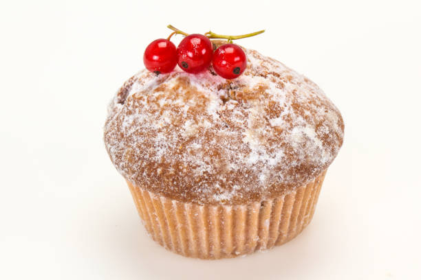 Sweet tasty muffin with red currants berries