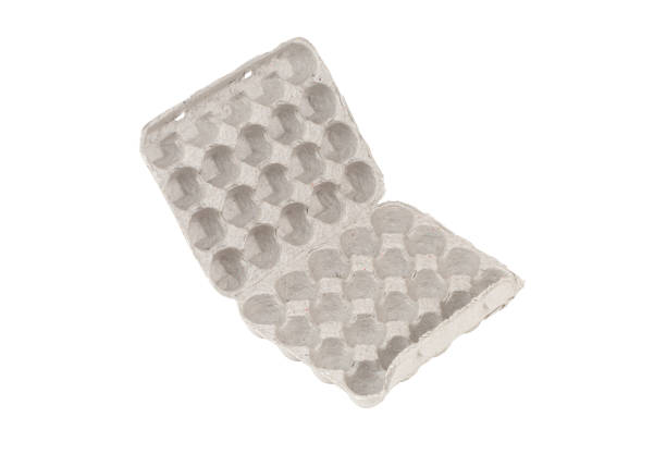 istock Egg box on a white background. Open cardboard box for eggs close-up. 1224663916