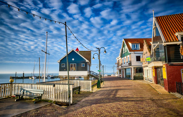 Volendam,the Netherlands Volendam is in North Holland, near Amsterdam. The famous tourist street in Volendam with souvenir shops, cafes and fish restaurants. Volendam is a historic fishing village on the IJsselmeer in North Holland. These photos of the empty streets and the port were taken during the pandemic in the spring of 2020.