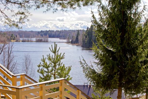 istock Modern wooden hilltop house with panoramic lake views. 1224665525