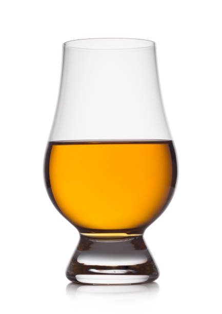 Scotch whiskey in crystal clencairn glass on white background. stock photo