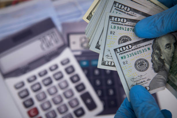 istock Counting dollars in corona days 1224673744