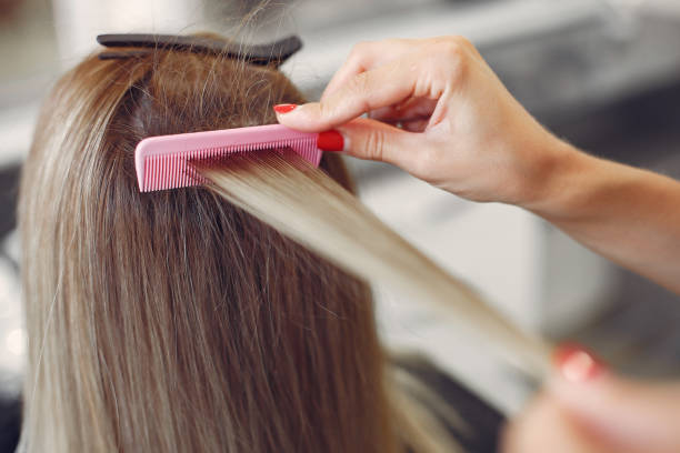 istock Hairdresser does hairstyle for her client 1224673820