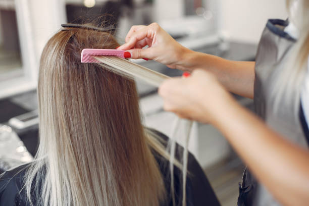 istock Hairdresser does hairstyle for her client 1224673832