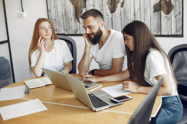 istock Young team working together and use the laptop 1224675362