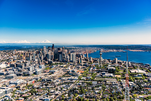 Wide angle aerial view of the city of Seattle, Washington and surrounding residential communities from an altitude of about 1500 feet.