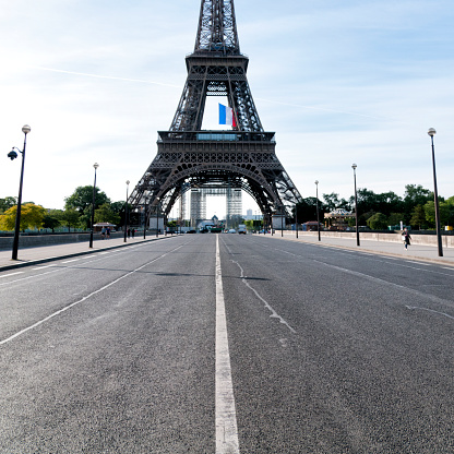 Paris : Iena Bridge, in front of Eiffel tower, near Trocadero is empty during pandemic Covid 19 in Europe. There are no people and no cars because people must stay at home and be confine. Schools, restaurants, stores, museums... are closed. Paris, in France. April 30th , 2020.