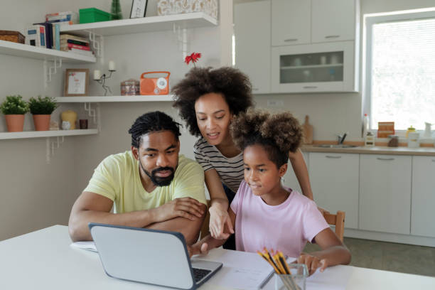 istock Parents Helping Their Daughter With Homework 1224688212