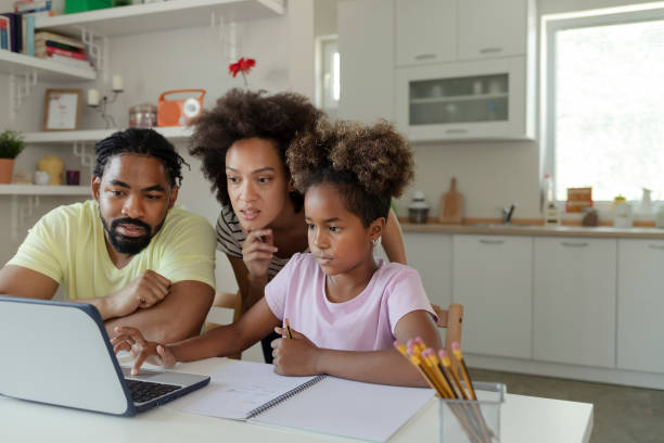 istock African American Parents Helping Their Daughter With Homework 1224688227