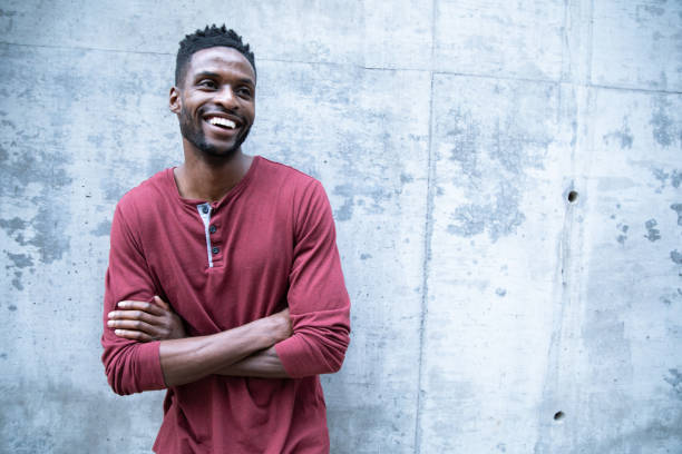 istock Black Male Against a Concrete Wall 1224689455