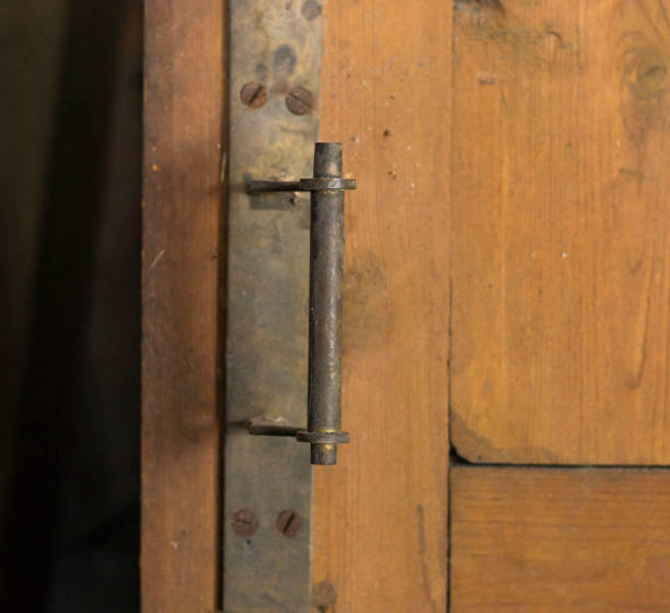 istock antique doorknob on an old open door 1224703080
