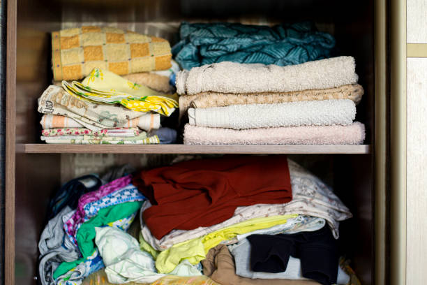 istock linen closet with shelves on which linen is laid out. 1224704034