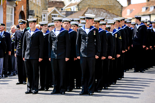 UK Armed Forces Day Parade Royal Navy Sailors from HMS Heron Marching through Sherborne Dorset, UK