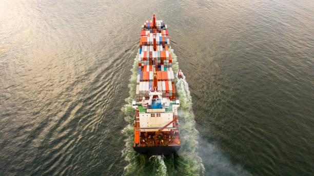 istock Container cargo ship  import export global business worldwide logistic and transportation, Container ship supply chain crisis, logistic crisis, Aerial view container cargo vessel boat freight ship. 1224712788