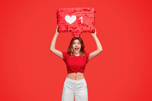 istock Excited lady with like banner 1224713740
