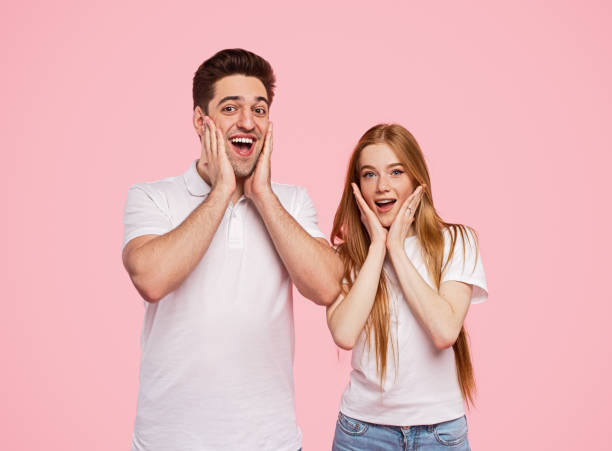 istock Excited man and woman looking at camera 1224713790