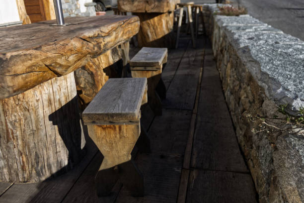 istock benches and tables made from a single wooden trunk in a cottage 1224716664