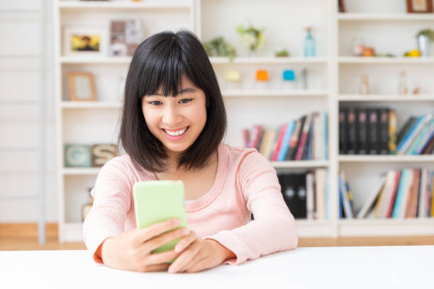 istock girl having a smart phone 1224716762