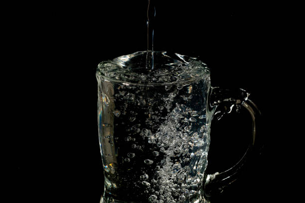 istock mug-full-of-water-and-ice-with-splash 1224716876