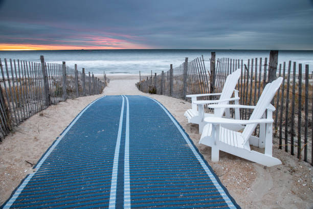 Cloudy autumn sunrise at the entrance to the beach at Beach Haven, NJ stock photo