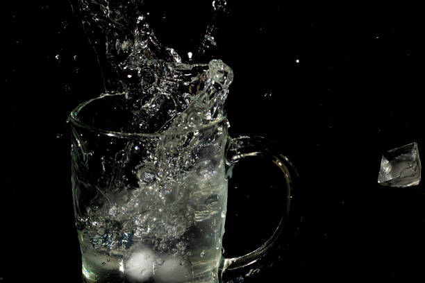 istock mug-full-of-water-and-ice-with-splash 1224717459
