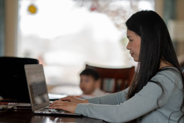 istock Mother Working from Home with Toddler Son 1224726305