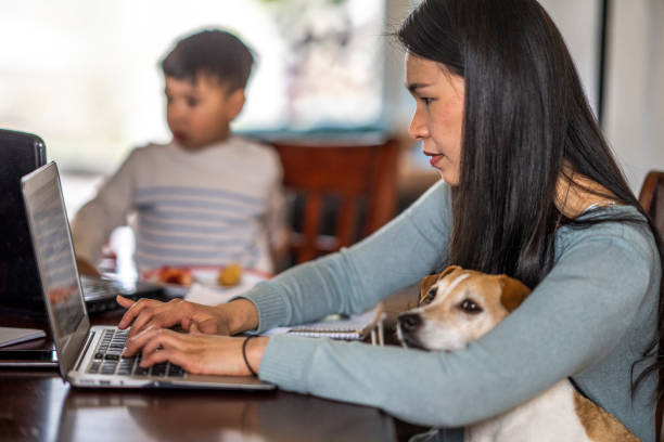 Mother Working from Home with Toddler Son