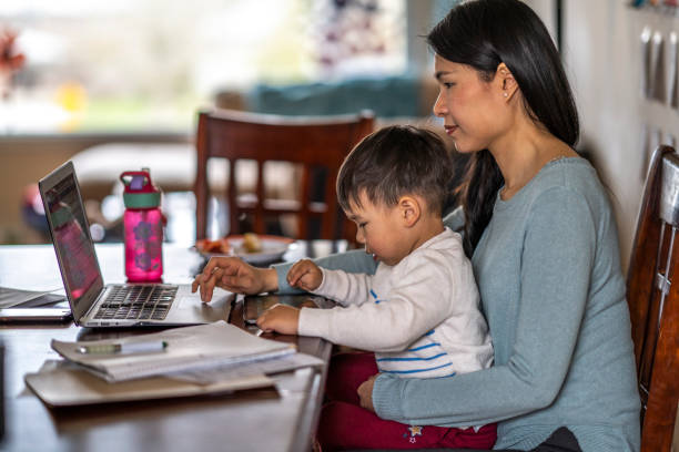 istock Mother Working from Home with Toddler Son 1224726328