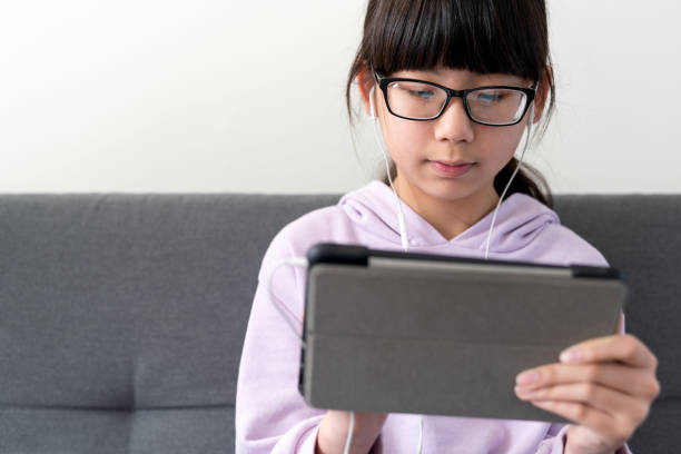 istock Female teenager using digital tablet 1224727495