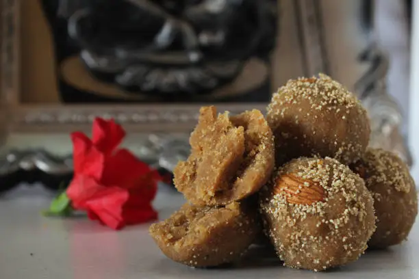 Churma ladoo is traditional Indian sweet made with wheat flour,jaggery and clarified butter made during festivals and auspicious occasions like ganesh chaturthi.selective focus