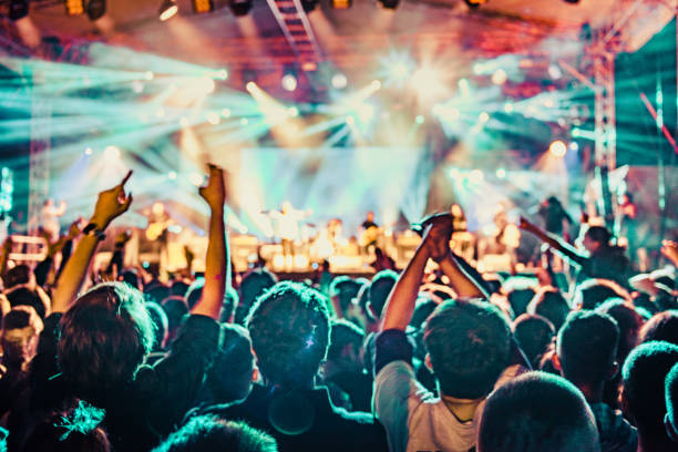 istock cheering crowd at rock concert 1224735606